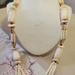 Carved Bovine Necklace